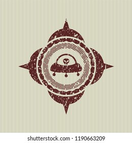 Red ufo with aline inside icon inside rubber grunge texture seal