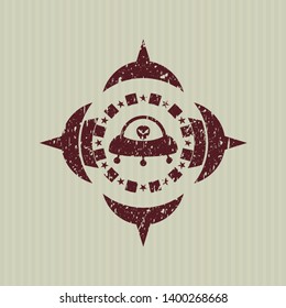 Red ufo with aline inside icon inside rubber seal with grunge texture