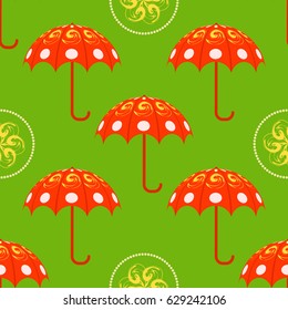 Red umbrellas on green background seamless pattern. Vector seamless pattern