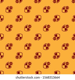 Red UV protection icon isolated seamless pattern on brown background. Sun and shield. Ultra violet rays radiation. SPF sun sign.  Vector Illustration