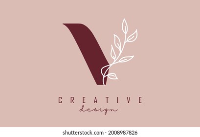 Red V letter logo design with white leaves branch vector illustration. Creative and elegant icon with letter V.
