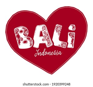 Red vector heart shape with ornate floral sign Bali Indonesia