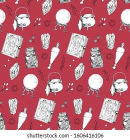 Red vector seamless pattern with magic attributes. Hand-drawn images of a magic book, precious stones, a witches cauldron, potion and herbs with berries. For fabric, textile, wrapping paper and covers