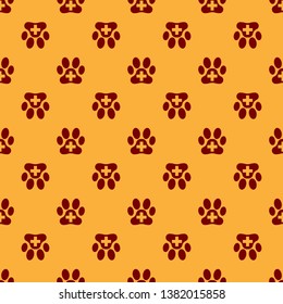 Red Veterinary clinic symbol icon isolated seamless pattern on brown background. Cross hospital sign. A stylized paw print dog or cat. Pet First Aid sign. Vector Illustration
