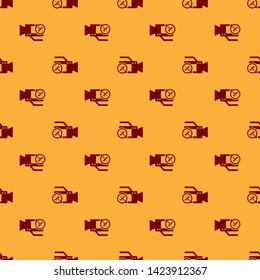 Red Video camera with screwdriver and wrench icon isolated seamless pattern on brown background. Adjusting, service, setting, maintenance, repair, fixing.  Vector Illustration