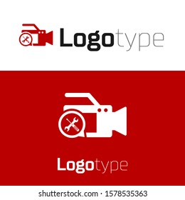 Red Video camera with screwdriver and wrench icon isolated on white background. Adjusting, service, setting, maintenance, repair, fixing. Logo design template element. Vector Illustration