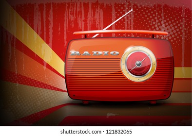 Red vintage radio on retro stripe background with vignetting