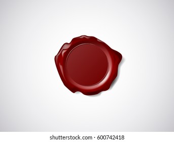 Red wax seal, signet or stamp isolated on white