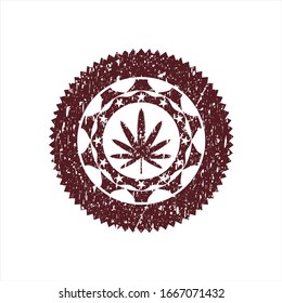 Red weed leaf icon inside distress rubber stamp