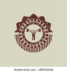 Red weightlifting icon inside distress rubber grunge stamp