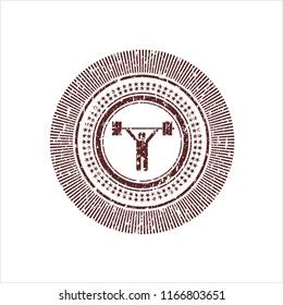 Red weightlifting icon inside distressed grunge style stamp