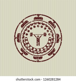 Red weightlifting icon inside distressed with rubber seal texture