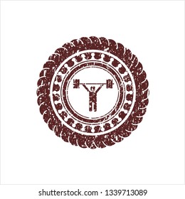 Red weightlifting icon inside distressed with rubber seal texture