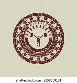 Red weightlifting icon inside rubber grunge stamp. 