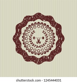 Red weightlifting inside of crown icon inside distress rubber grunge stamp