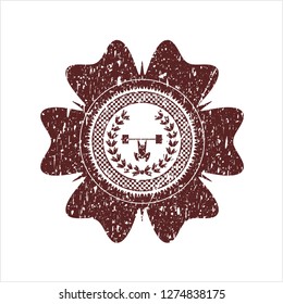 Red weightlifting inside of crown icon inside rubber grunge stamp
