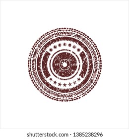 Red weightlifting or powerlifting plate (45 lbs) icon inside distressed grunge stamp