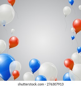 Red, white and blue balloons on grey background