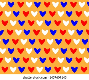 Red, white and blue heart pattern on a light orange background