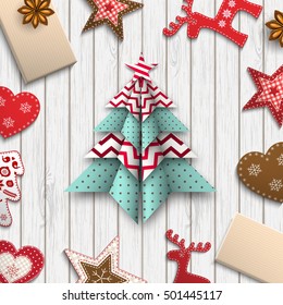 red, white and blue origami tree on gray wooden background lying among small farmhouse decorations, abstract christmas theme inspired by flat lay style, vector illustration, eps 10 with transparency