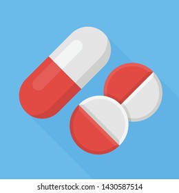 Red and white capsule and tablet pills on blue background, Flat medicine icon