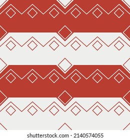 Red and white diamonds. Vector with seamless red rhombs.