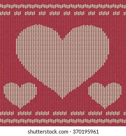 Red and white knitted background with hearts