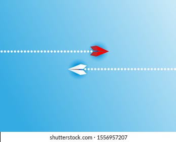 Red and white paper planes flying in different directions, blue background. dissenting opinion, divergent views concepts
