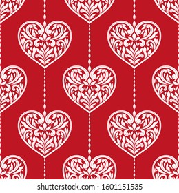 Red and white seamless floral pattern with decorative hearts. Vintage vector background template, luxury flourish elements. Great for fabric, wallpaper, decoration, packaging or any esired idea.