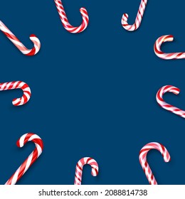 Red and white striped candy cane sticks frame on blue background. Space for text. Vector illustration.
