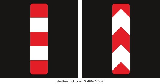 Red and white striped delineator posts mark the edge of a road, enhancing visibility for drivers, especially in challenging conditions.