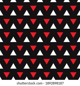 Red, white triangle seamless pattern isolated on black background. Fabric designs and wallpapers.