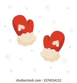 Red winter gloves with snowflakes on white background.