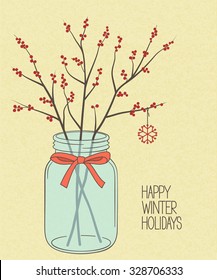 Red winterberry twigs in Mason jar over rough brown paper texture for Christmas and New Year design