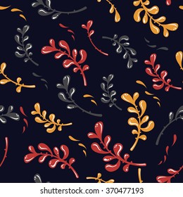 Red, yellow and blue leaves with petals on navy background