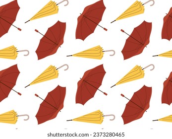 Red and yellow Umbrellas in various positions seamless pattern. Open and folded umbrellas. Vector illustration in flat style