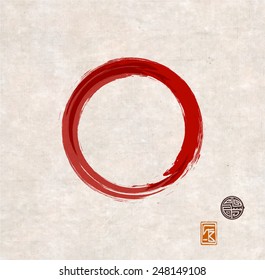 Red zen circle on vintage rice paper with decorative stamps. Red circle hand-drawn with ink.