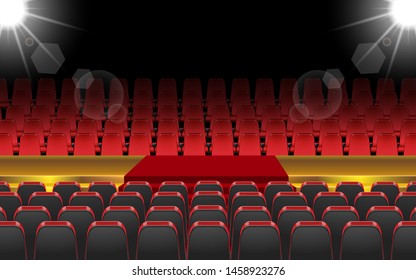 redchairs and golden stage in the hall