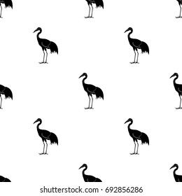 Red-crowned crane icon in black style isolated on white background. Japan symbol stock vector illustration.