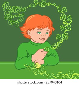 Red-haired boy in a green shirt with shamrock.