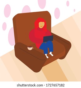 red-haired girl with a laptop in a chair