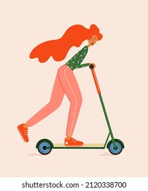 Red-haired young girl rushes on a scooter