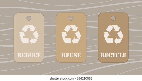 Reduce reuse recycle tags over a wood table