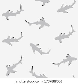 Reef sharks swim in  water. Simple seamless pattern with shark. Flat design print.