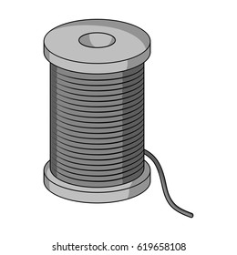 A reel of blue thread.Sewing or tailoring tools kit single icon in monochrome style vector symbol stock illustration.