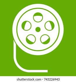 Reel with film icon white isolated on green background. Vector illustration