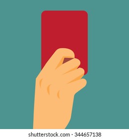 Referee hand showing red card
