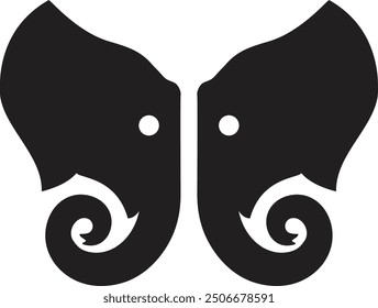 Reflection of elephant profile silhouette that creates butterfly
