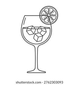 Refreshing gin and tonic cocktail with ice cubes and lime slice in a wine glass