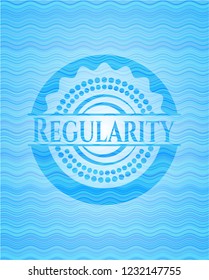 Regularity light blue water wave emblem.